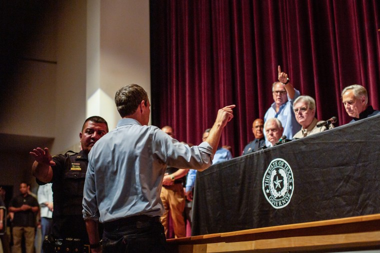 Democrat Beto O'Rourke interrupts a news conference headed by Texas Gov. Greg Abbott in Uvalde, Texas on May 25, 2022.