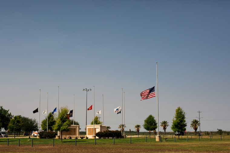 Flags stand at half staff in Uvalde, Texas on May 25, 2022.