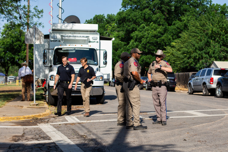 State troopers and law enforcement outside Robb Elementary School in Uvalde, Texas, on May 25, 2022.
