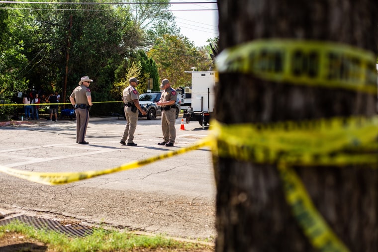 Crime scene tape surrounds Robb Elementary School in Uvalde, Texas, on May 25, 2022.