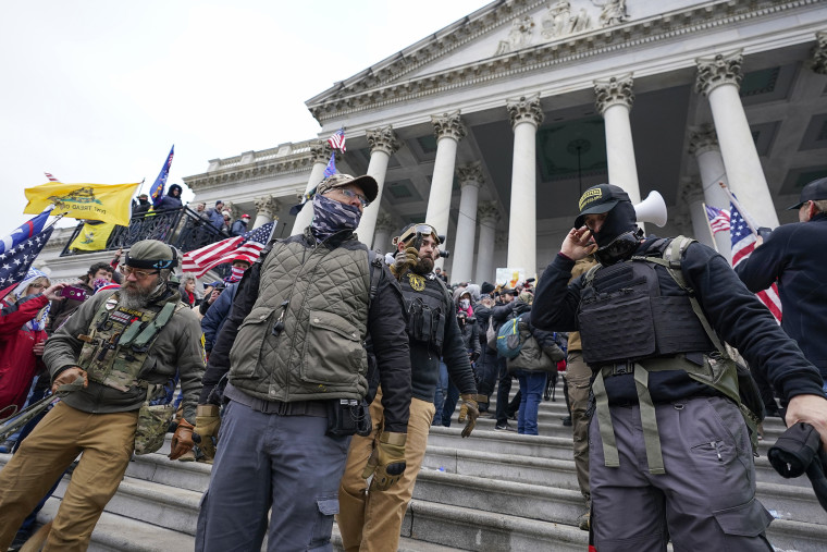 Image: Members of the Oath Keepers on the East Front of the Capitol on Jan. 6, 2021.