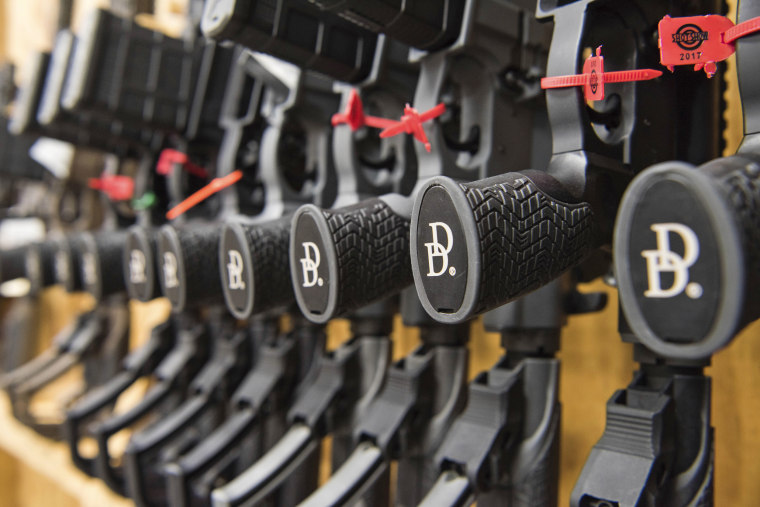 A row of AR-15 style rifles manufactured by Daniel Defense  in a vault at the company's headquarters in Black Creek, Ga., in 2017. 