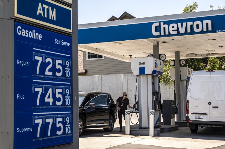 A customer refuels at a Chevron gas station in Menlo Park, Calif., on May 24, 2022.