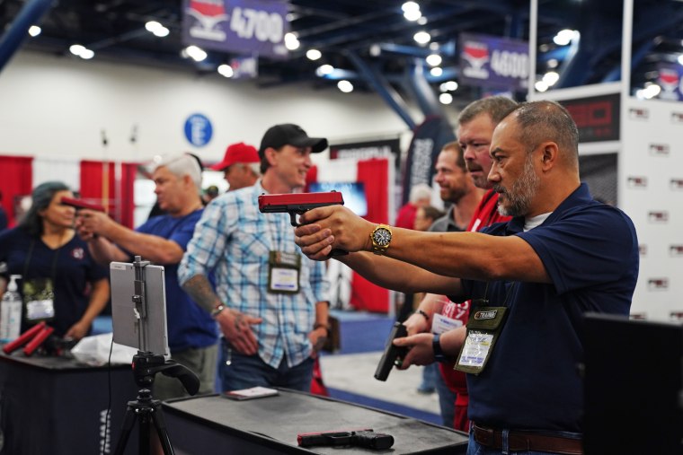 Visitors at the annual NRA meeting Friday in Houston. 