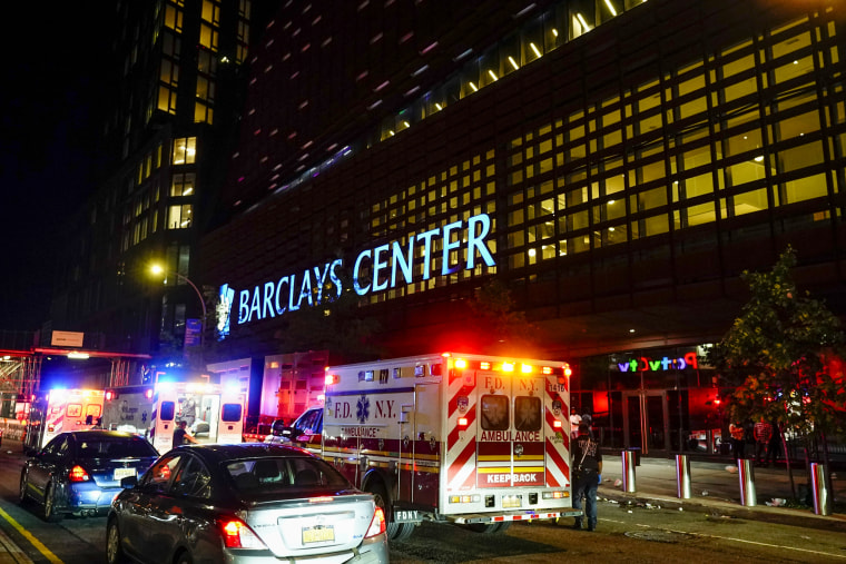 Ambulances gather outside of Barclays Center after a WBA lightweight championship boxing bout on May 29, 2022, in New York.