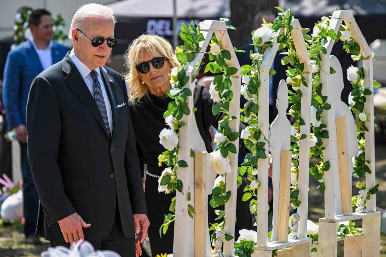 President Joe Biden and Jill Biden pay their respects at a memorial outside of Robb Elementary School in Uvalde, Texas, on May 29, 2022.