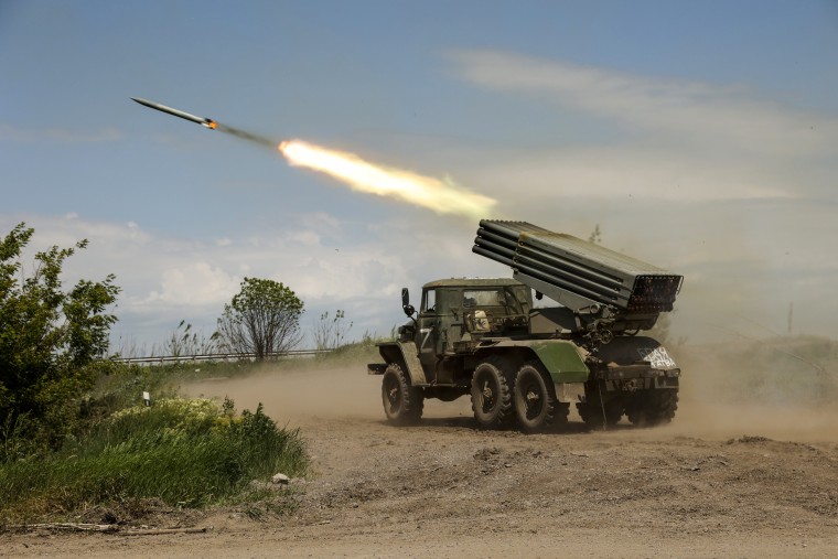 A Donetsk People's Republic militia's multiple rocket launcher fires from its position not far from Panteleimonivka, in territory under the government of the Donetsk People's Republic, eastern Ukraine, on May 28, 2022.