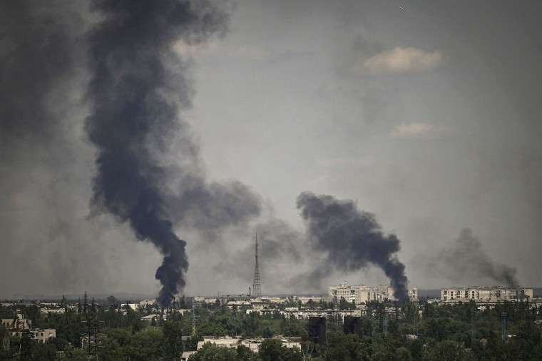Smoke rises in the city of Severodonetsk during heavy fighting between Ukrainian and Russian troops in the Donbas region on May 30, 2022.