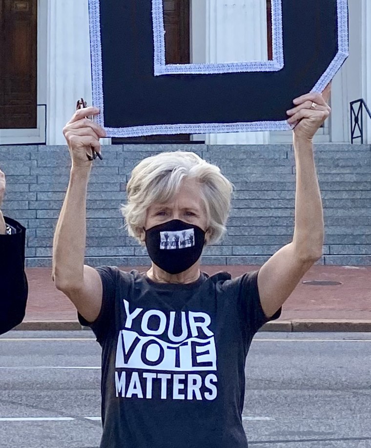 Taussig pictured during one of many political rallies she has attended. At age 71, she says she's still fighting for people's right to access abortion care.