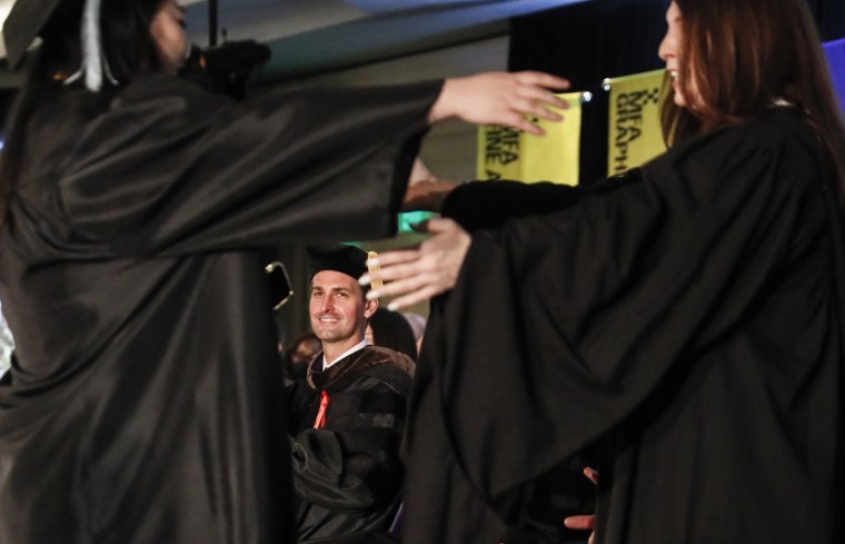 Evan Spiegel and Miranda Kerr Pay Debts of Otis College Graduates