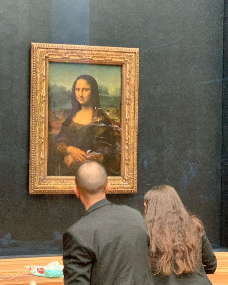 Mona Lisa Attacked in Louvre With Cake By Man Wearing Wig