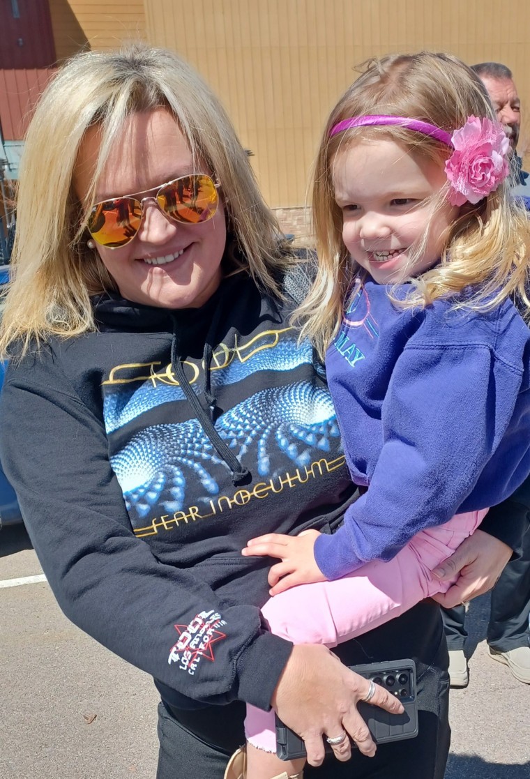 Columbine survivor Missy Mendo and her 4-year-old daughter, Ellie