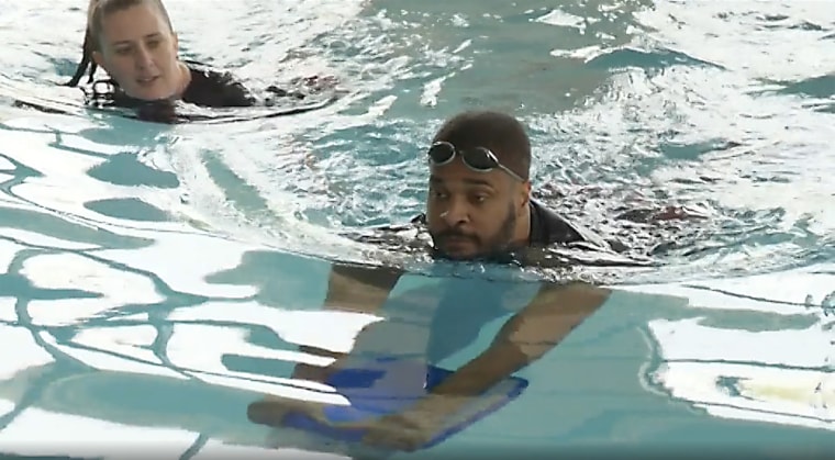 Ryan was under the watchful eye of his swimming instructor.