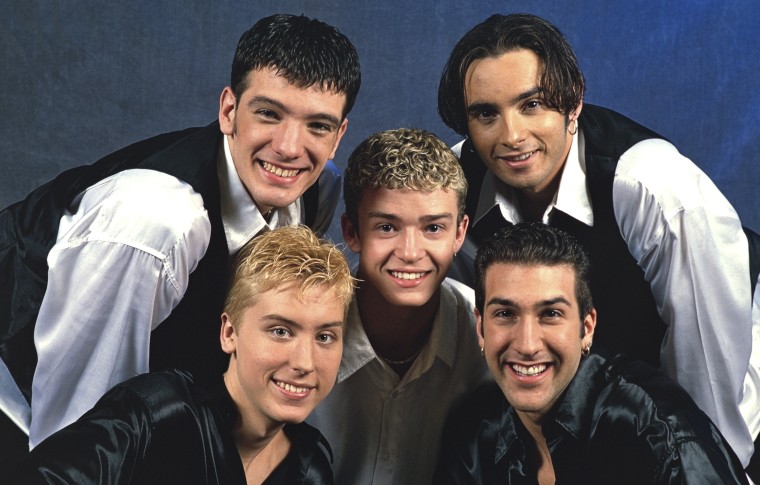 Lance Bass posed in 1997 with fellow NSYNC members JC Chasez, Joey Fatone, Chris Kirkpatrick and Justin Timberlake. Bass came out as gay in 2006.