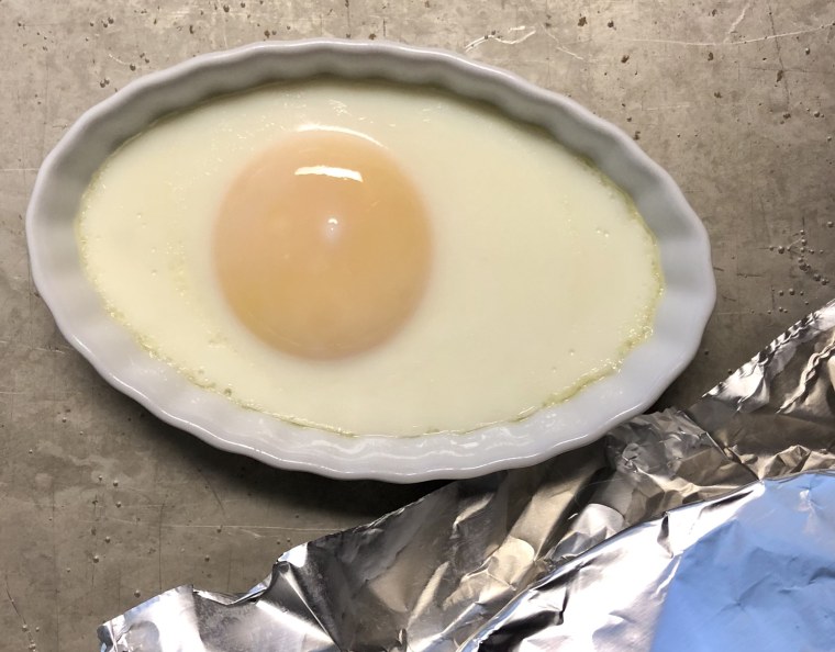 Don’t let the evil eye fool you -- the foil-covered baked egg came out perfectly.