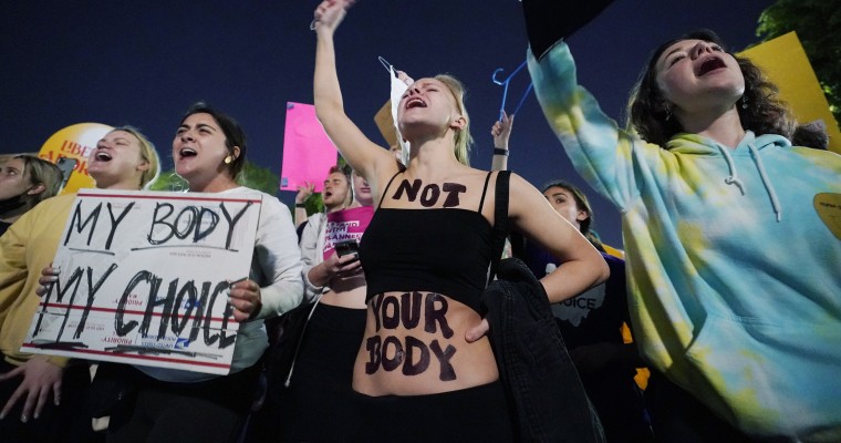 A crowd of people gather outside the Supreme Court, May 3, 2022 in Washington after a draft opinion circulated among Supreme Court justices confirmed that a majority of them supported overturning the 1973 case Roe v. Wade that legalized abortion nationwide.