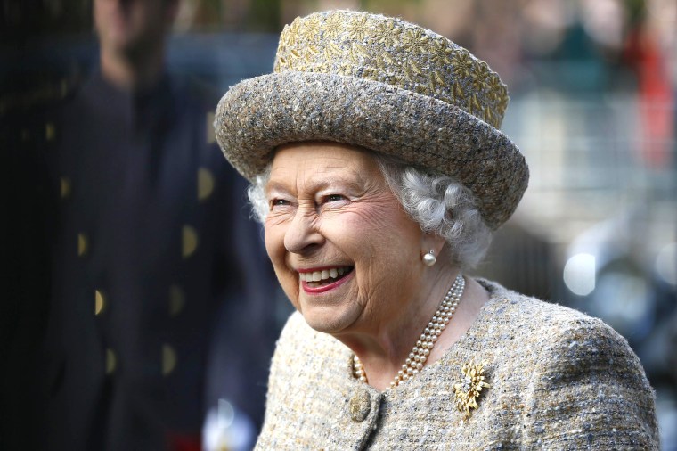 Queen Elizabeth II smiles as she arrives before the Opening of the Flanders' Fields Memorial Garden at Wellington Barracks on November 6, 2014 in London, England.