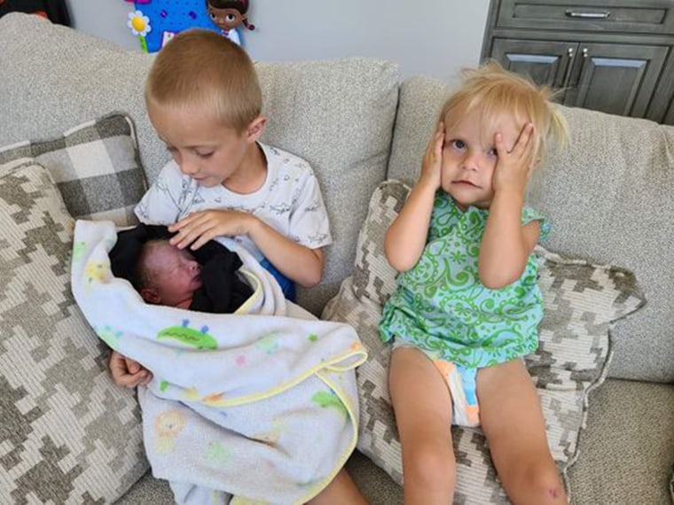 Everyone in the Skaats family is thrilled about their new little brother; although the youngest (on the right) is a little displeased at losing her spot as the baby of the family.