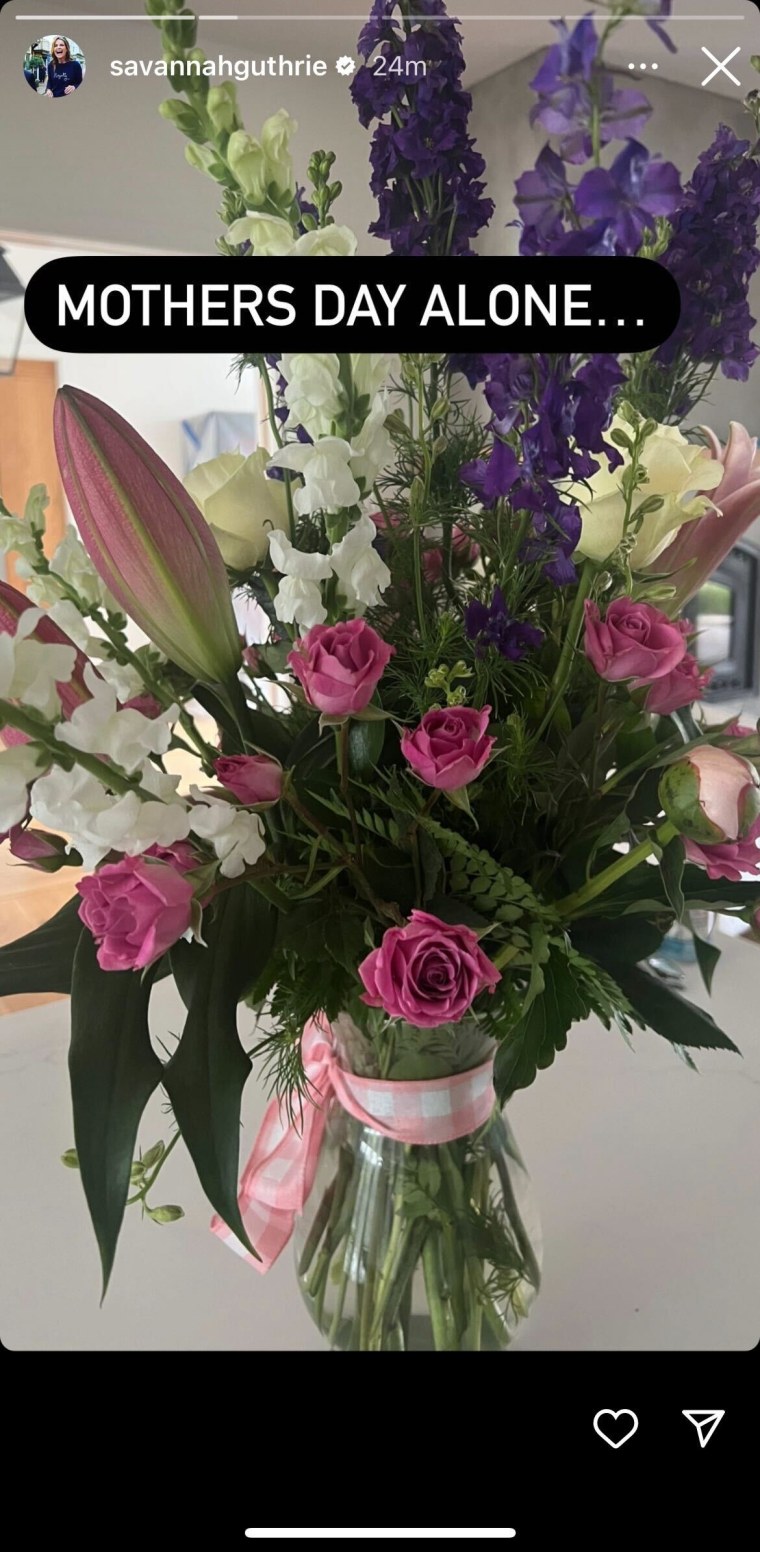 The gorgeous bouquet included a pink plaid ribbon and colorful roses.