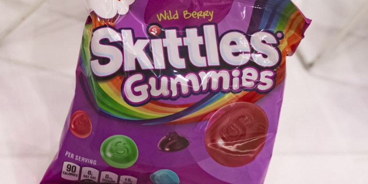 A bag of Skittles Gummies on display in 2021.