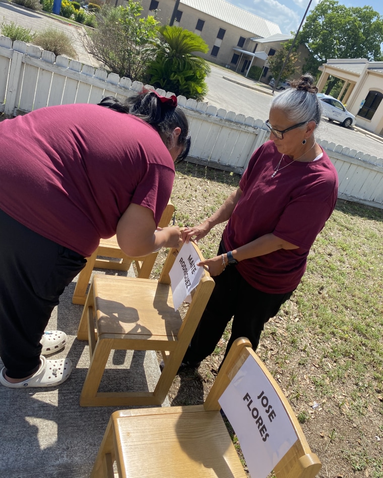 Lydia and Monica Morales create a memorial for the Texas school shooting victims using little chairs from their daycare; Monica remembers many of the victims as toddlers and preschoolers.
