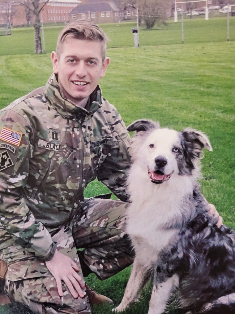 Black's son with his dog.