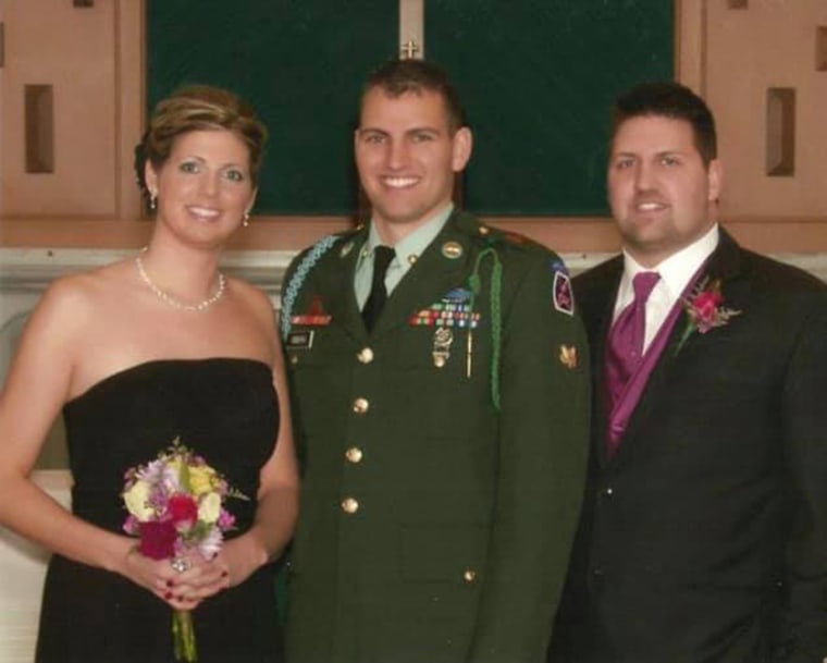 Tracy (left) pictured with her brothers Brady (center) and Bradley Oberg.