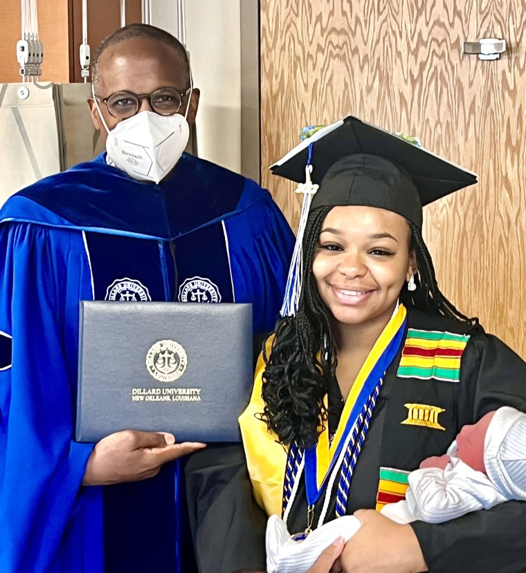 Dillard University President Walter Kimbrough with graduate Jada Sayles and her son Easton.