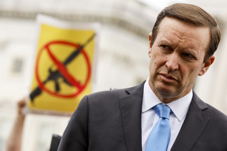 Sen. Chris Murphy, D-Conn., attends a rally with fellow Senate Democrats and gun control advocacy groups outside the Capitol on May 26, 2022.
