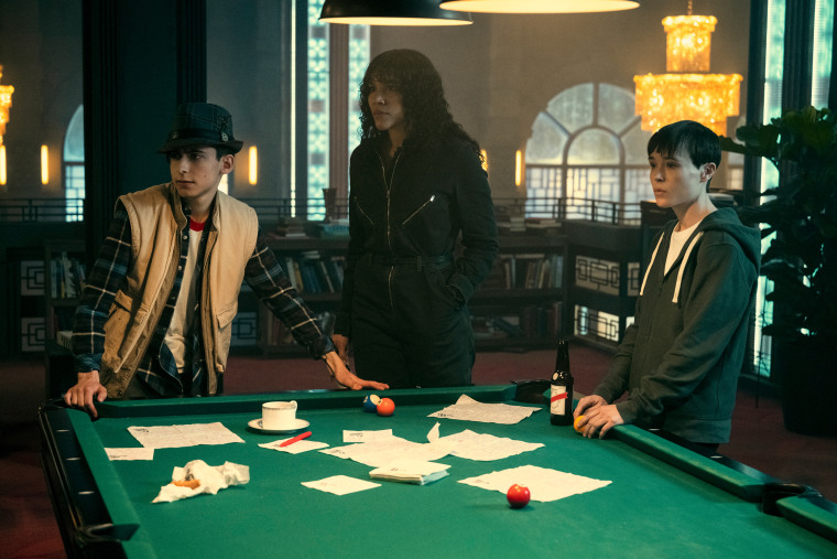 Image: Aidan Gallagher as Number Five, Emmy Raver-Lampman as Allison Hargreeves and Elliot Page as Viktor Hargreeves in "The Umbrella Academy."