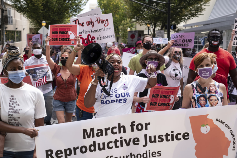 Abortion rights supporters march in Atlanta on eproductive Justice on Oct. 2, 2021.