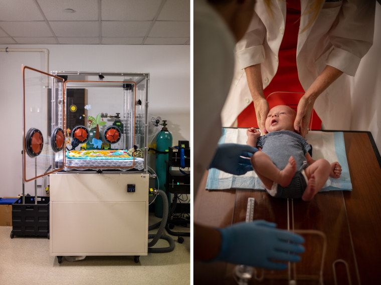 At left, an infant metabolic chamber, and right, Redman holds the head of Jameson while Ph.D. Emily Flanagan assists, as they measure the baby.