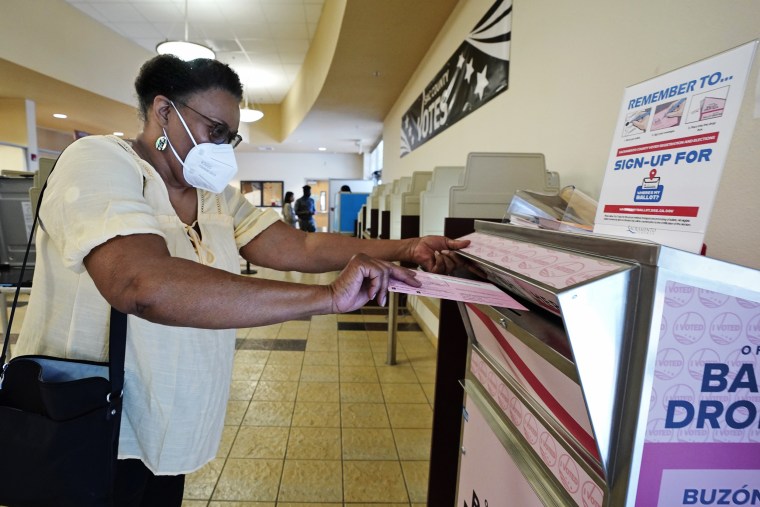 A woman casts her ballot in the California primary in Sacramento on Friday. California voters have until Tuesday to cast their votes in the primary. 