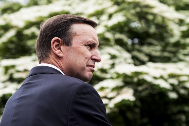 Sen. Chris Murphy, D-Conn., conducts a rally outside the Capitol to demand the Senate take action on gun safety on May 26, 2022, in the wake of the Robb Elementary School shooting in Texas.