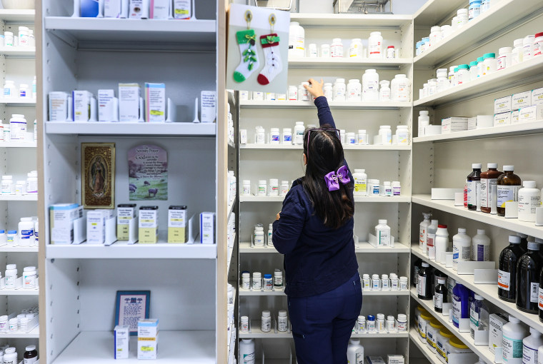 A pharmacy technician, works in a pharmacy on Dec. 22, 2020 in Miami.