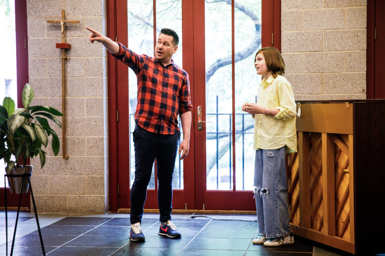 Steven Kroeze indicates where Michael Coppola should direct his voice during a vocal lesson at Trinity Lower East Side Lutheran Parish on May 28, 2022, in New York.