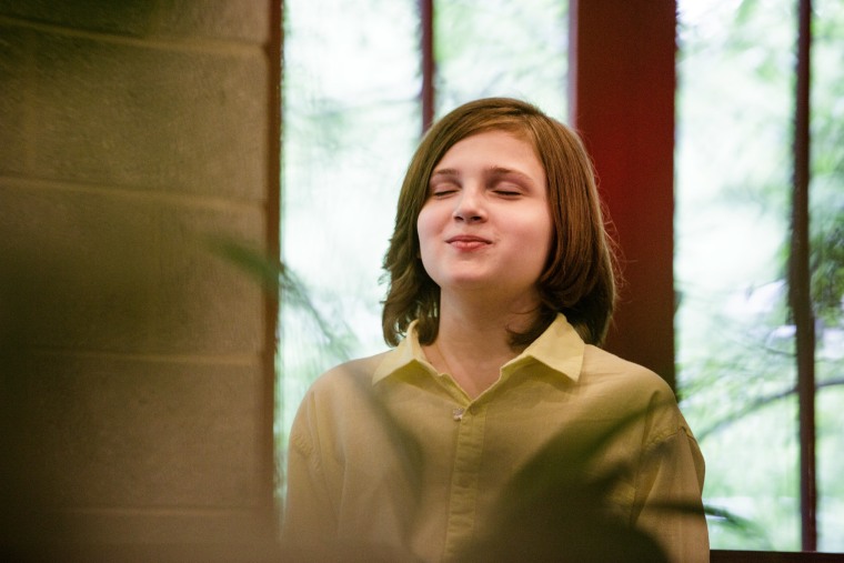 Michael Coppola practices singing during a voice lesson at Trinity Lower East Side Lutheran Parish on May 28, 2022, in New York.