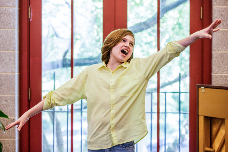 Michael Coppola sings "Let It Go" during a voice lesson at Trinity Lower East Side Lutheran Parish on May 28, 2022, in New York. On the cusp of high school, Michael, who is gay and gender-nonconforming, has faced intense bullying since the 4th grade. His mother has filed a complaint with the New York Division of Human Rights against the Smithtown Central School District after they required her to sign an NDA in order to authorize transfering Michael to a new school.