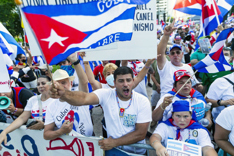 Activists participate in a rally at Bayfront Park in solidarity with the anti-government protests happening in Cuba, in downtown Miami, on July 31, 2021.