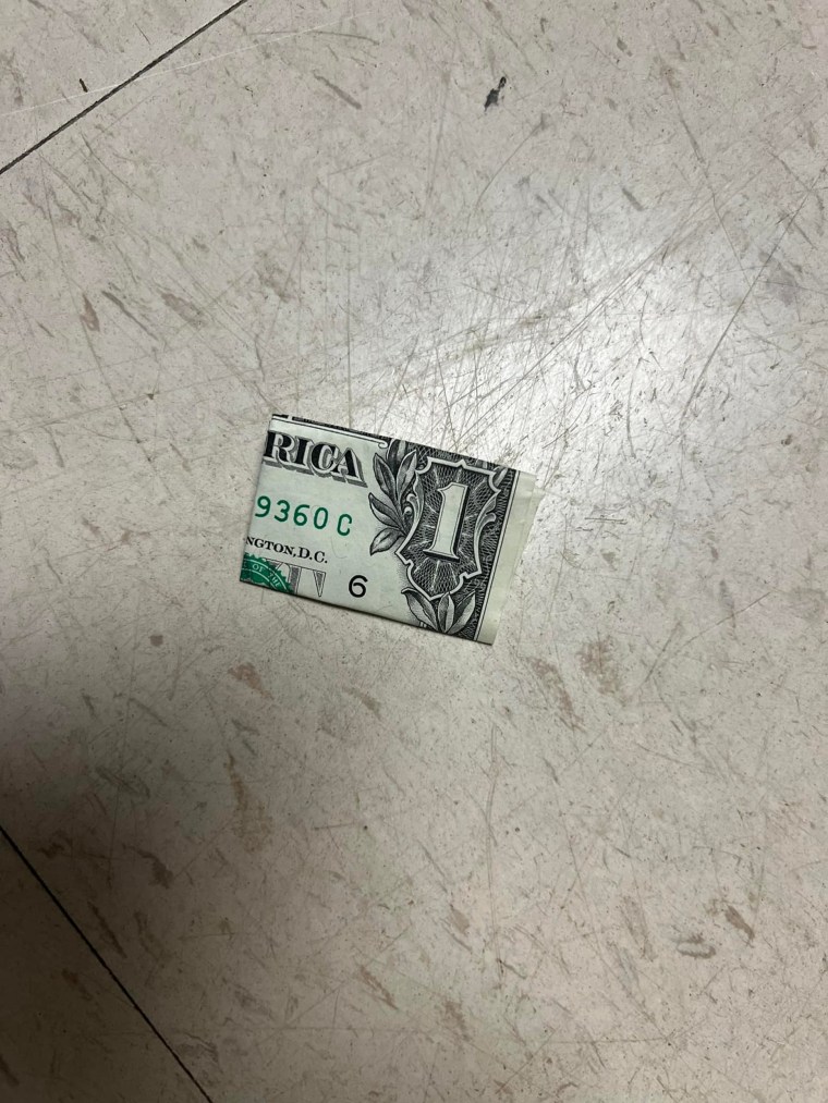 A folded dollar bill