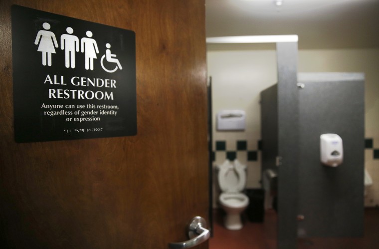 An all gender bathroom sign in San Francisco.