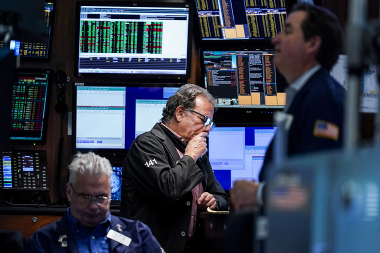 Traders work on the floor at the New York Stock Exchange on June 15, 2022.