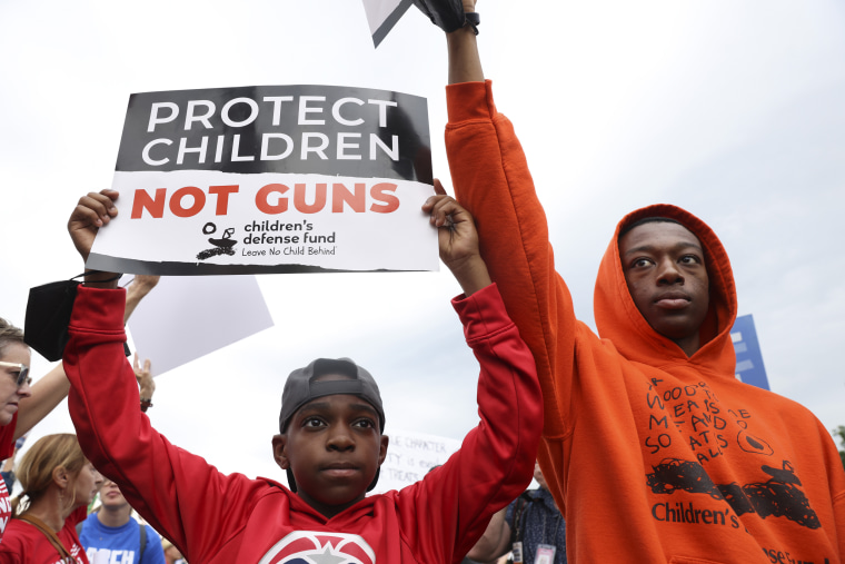 Image: Demonstrators attend a March for Our Lives rally against gun violence on the National Mall on June 11, 2022 in Washington.