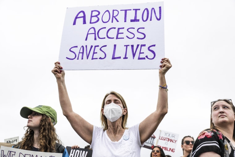 Abortion rights demonstrators and advocates attend the "Bans Off Our Bodies" rally on the National Mall in Washington on May 14, 2022.