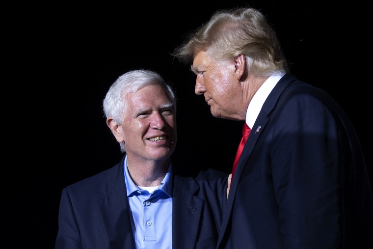 Image: Former President Donald Trump greets Rep. Mo Brooks, R-Ala., at a rally in Cullman, Ala., in 2021.