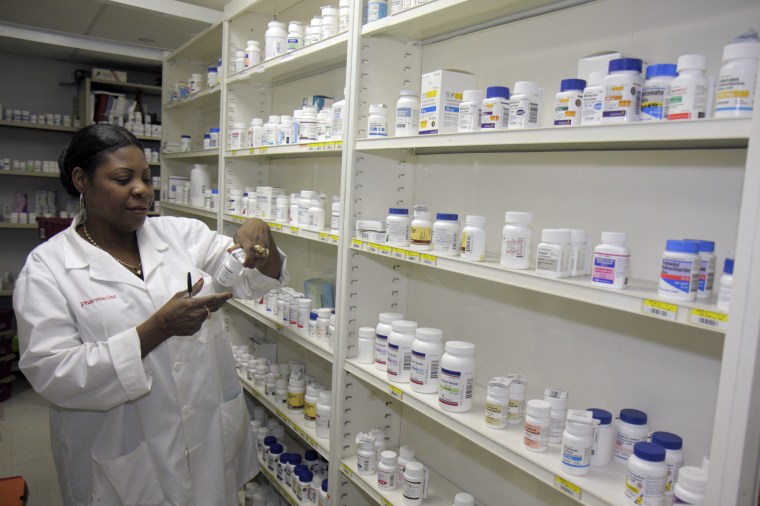 A pharmacy technician fills a prescription at the Borinquen Health Care Center in New York City on June 8, 2009.