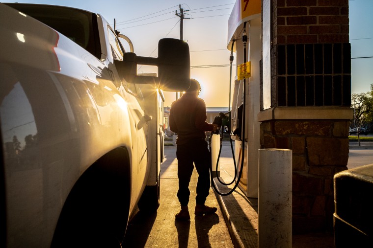 A person prepares to pump gas at a Shell gas station on April 1, 2022 in Houston, Texas.
