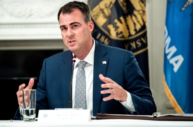 Image: Oklahoma Governor Kevin Stitt speaks during a roundtable discussion with President Donald Trump in the State Dining Room of the White House on June 18, 2020.