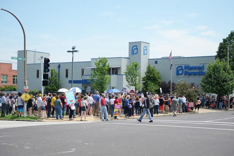 Anti-abortion demonstrators protest outside the Planned Parenthood