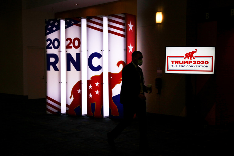 Image: Delegates arrive for the first day of the Republican National Convention at the Charlotte Convention Center on August 24, 2020, in Charlotte, N.C.
